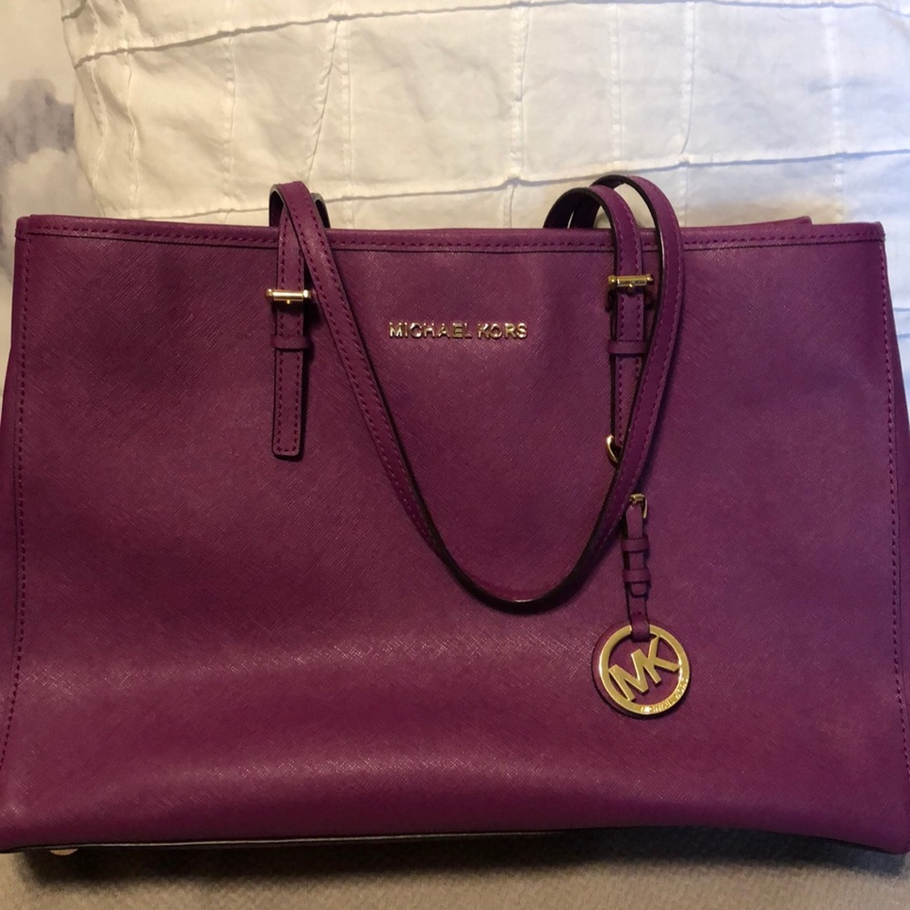 Beautiful plumb colored Michael Kors bag!